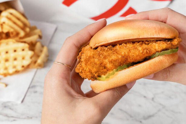 Female hands holding a Chick-fil-A® Chicken Sandwich